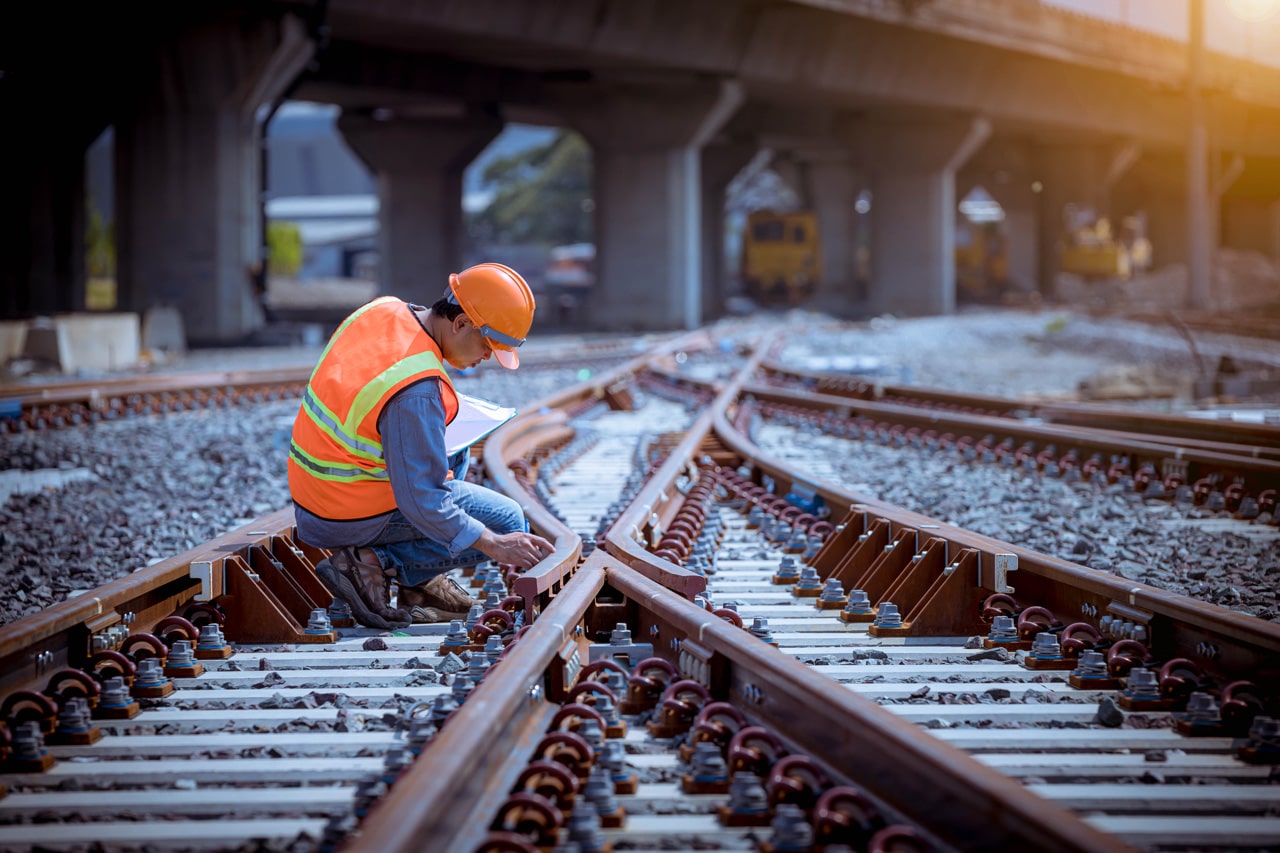 Man inspecting rail