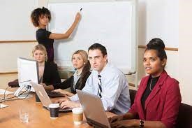 Men and women in skills training seminar