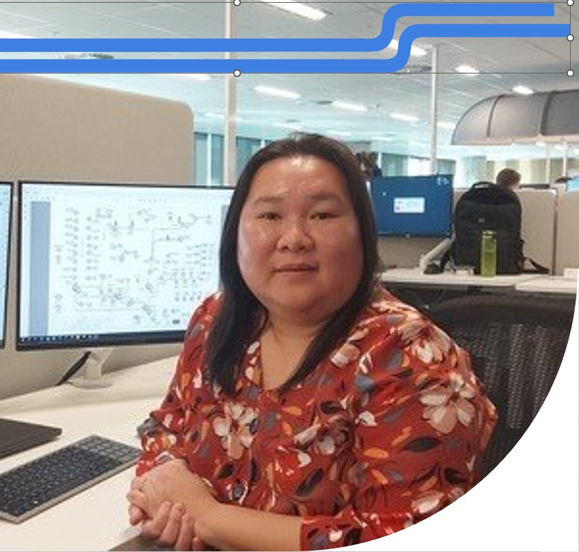 Asian woman working in South Australian Public Transport Authority office.