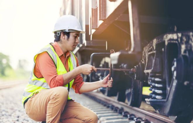 Man fixing a train