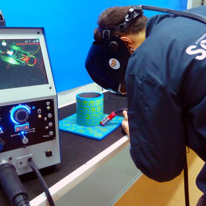 Welding student using augmented reality training technology.